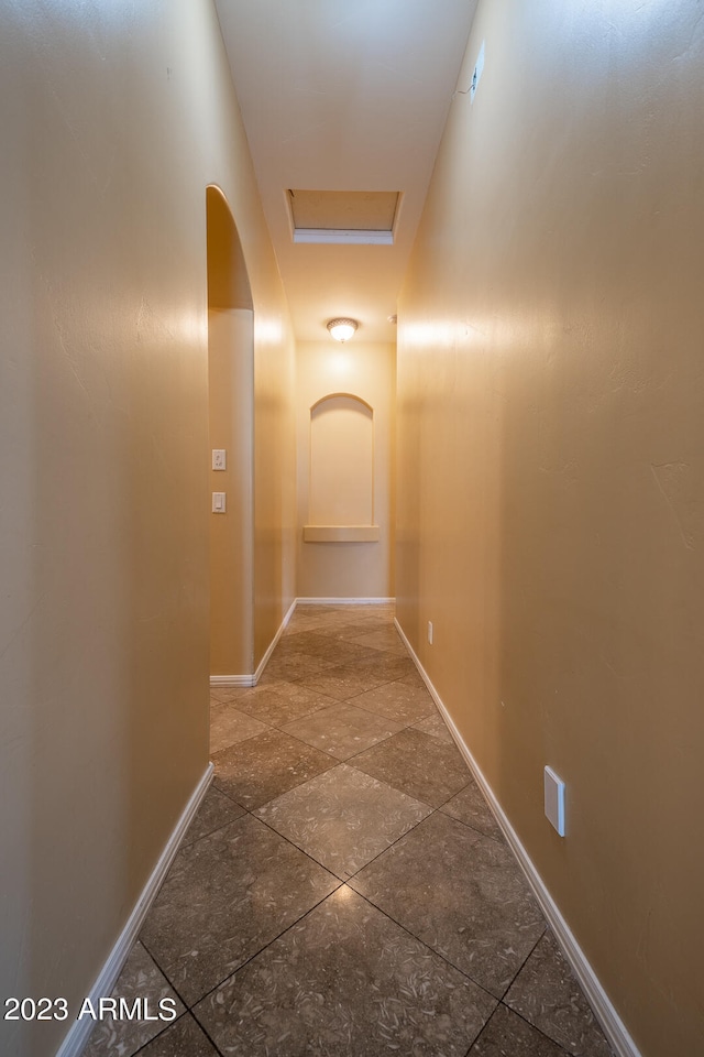 corridor with tile floors