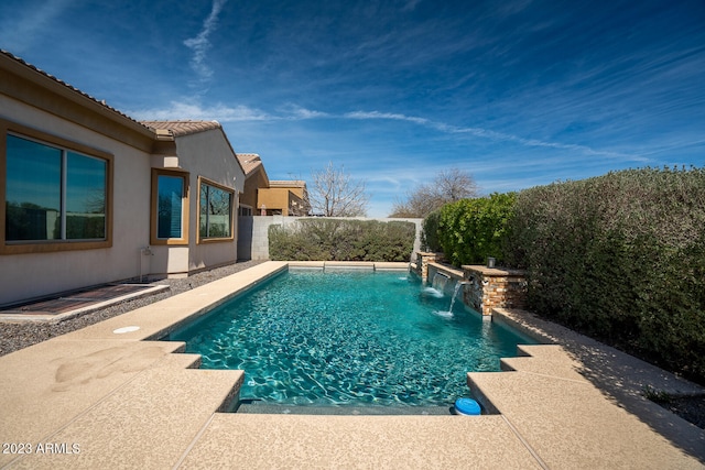 view of swimming pool featuring a patio area and pool water feature