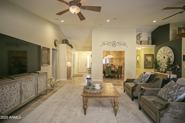 living room with high vaulted ceiling and ceiling fan