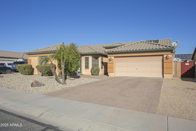 view of front of home with a garage