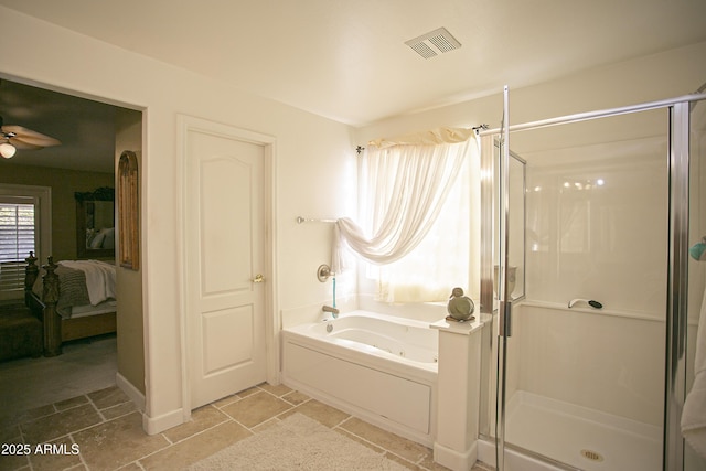 bathroom featuring ceiling fan and shower with separate bathtub