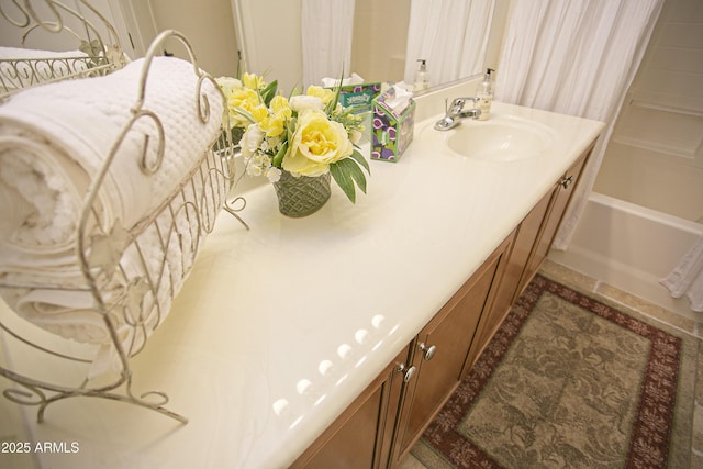 bathroom with vanity and shower / tub combo with curtain