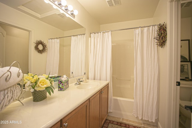 bathroom featuring vanity and shower / bath combination with curtain