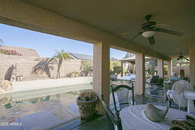 view of patio with ceiling fan