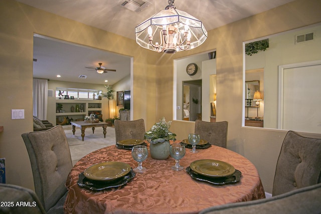 dining room featuring ceiling fan with notable chandelier, pool table, and lofted ceiling