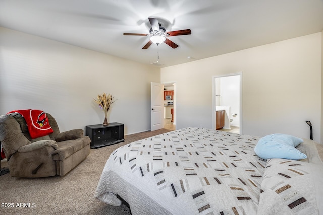 bedroom with light carpet, connected bathroom, and ceiling fan