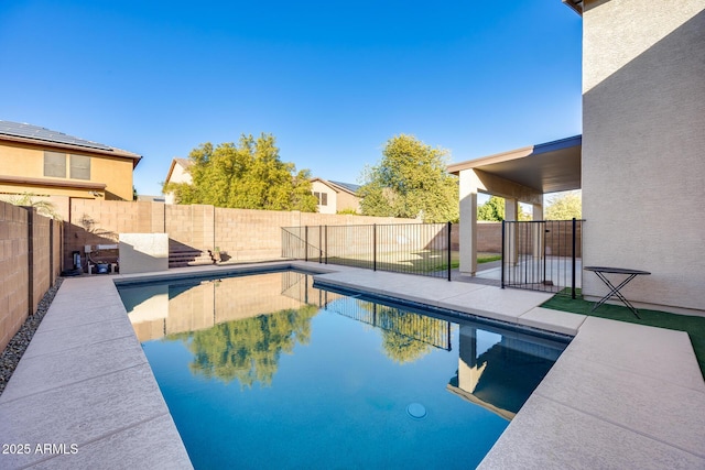 view of pool featuring a patio area