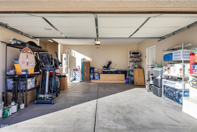 garage with electric water heater