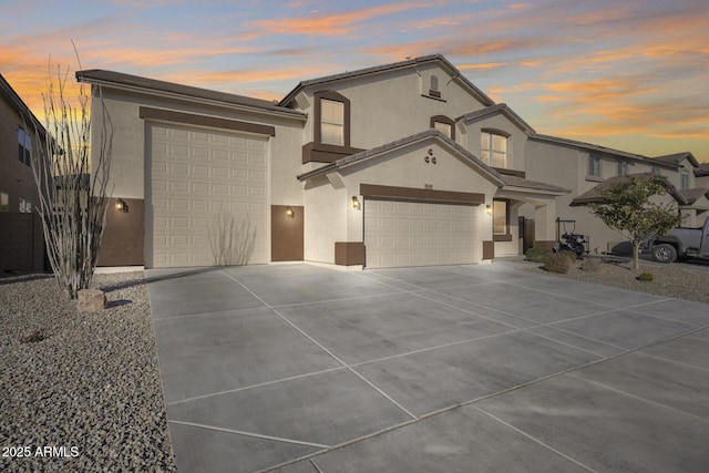 view of front of property with a garage