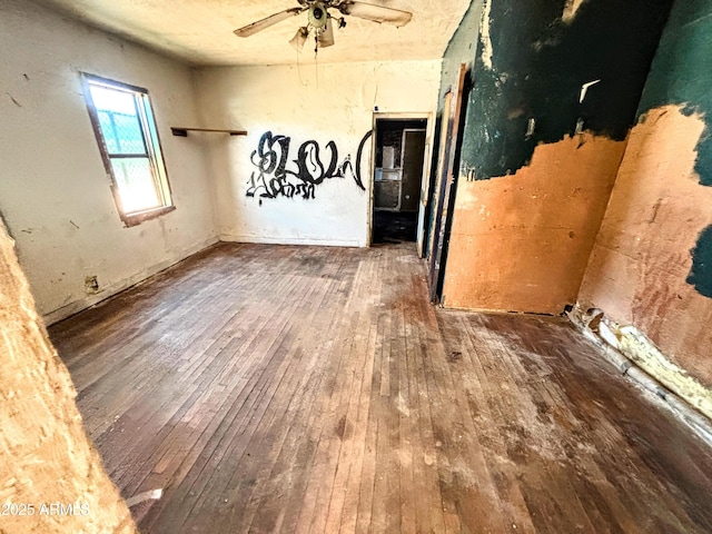 216 W Third St, Winslow, AZ 86047 - empty room featuring wood-type flooring and a ceiling fan