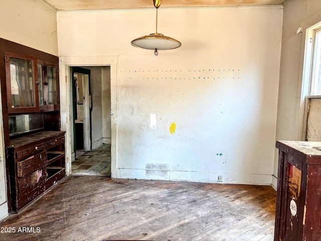 216 W Third St, Winslow, AZ 86047 - unfurnished dining area featuring wood finished floors