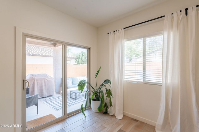 948 E Wiley Way, Casa Grande, AZ 85122 - entryway featuring light wood-style flooring and baseboards