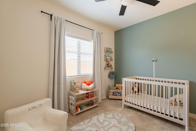 948 E Wiley Way, Casa Grande, AZ 85122 - bedroom featuring carpet floors, a nursery area, and ceiling fan