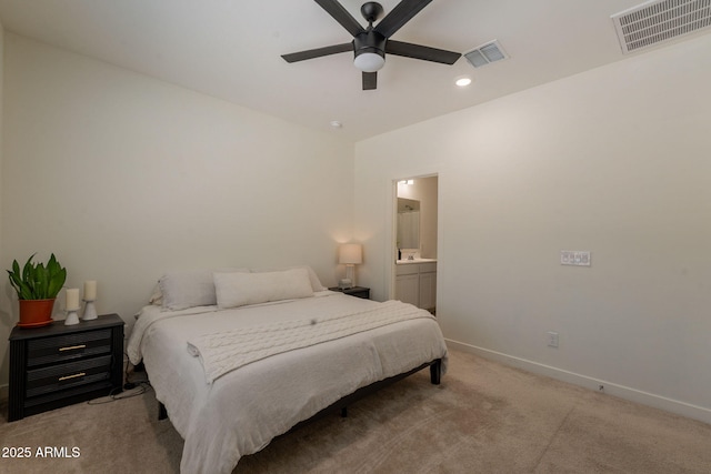 948 E Wiley Way, Casa Grande, AZ 85122 - bedroom with light colored carpet, baseboards, recessed lighting, connected bathroom, and a ceiling fan