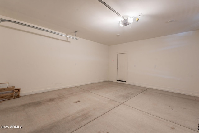 948 E Wiley Way, Casa Grande, AZ 85122 - garage with a garage door opener and baseboards