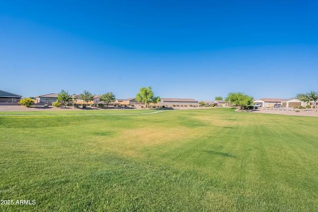 948 E Wiley Way, Casa Grande, AZ 85122 - view of grassy yard featuring a residential view