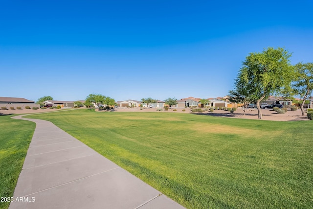 948 E Wiley Way, Casa Grande, AZ 85122 - surrounding community featuring a residential view and a yard