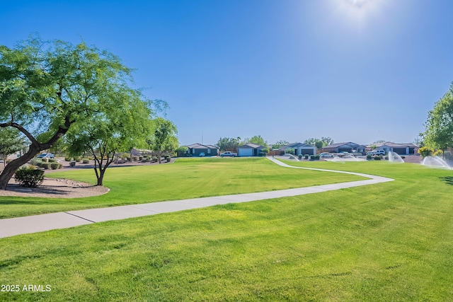 948 E Wiley Way, Casa Grande, AZ 85122 - view of home's community featuring a yard and a residential view
