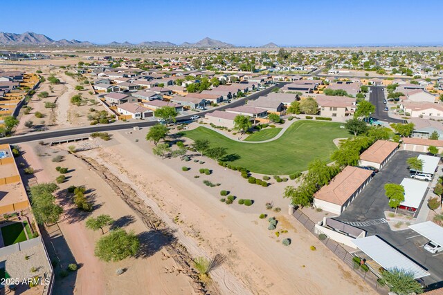 948 E Wiley Way, Casa Grande, AZ 85122 - aerial overview of property's location with mountains and nearby suburban area