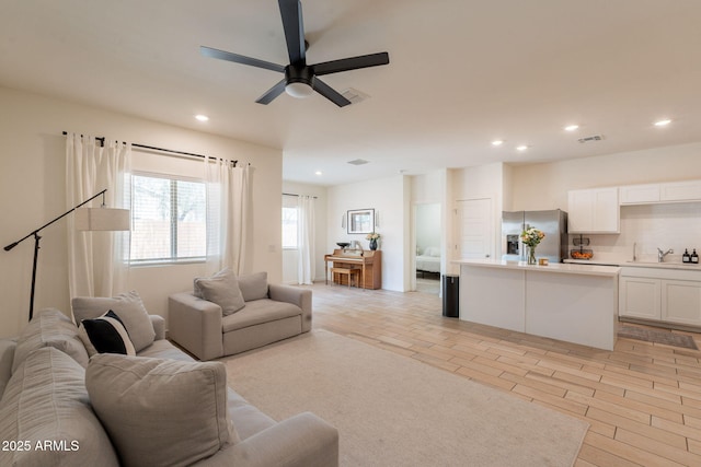 948 E Wiley Way, Casa Grande, AZ 85122 - living room with recessed lighting and ceiling fan