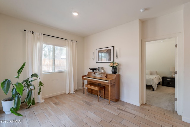 948 E Wiley Way, Casa Grande, AZ 85122 - sitting room featuring light wood-style floors and baseboards