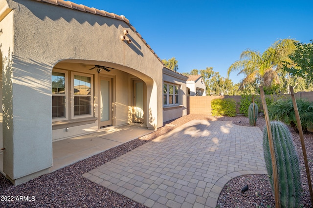 view of patio / terrace featuring ceiling fan