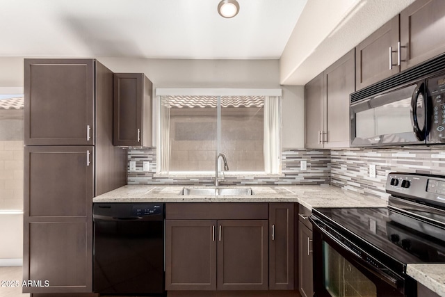 1379 E Butler Cir, Chandler, AZ 85225 - kitchen featuring black appliances, backsplash, light stone counters, and dark brown cabinetry