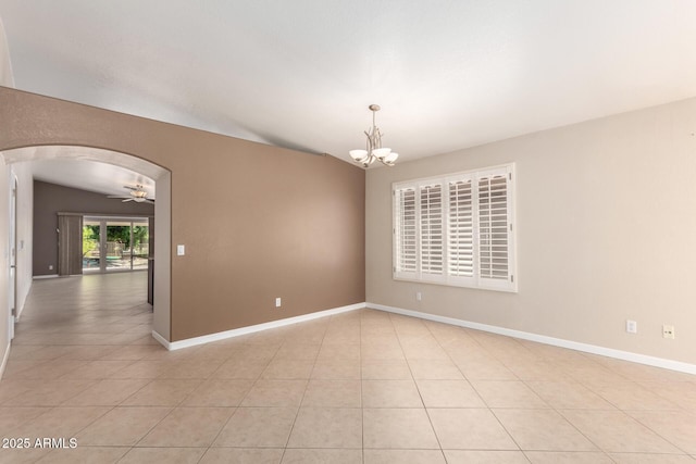 1379 E Butler Cir, Chandler, AZ 85225 - empty room with vaulted ceiling, a chandelier, light tile patterned flooring, arched walkways, and ceiling fan