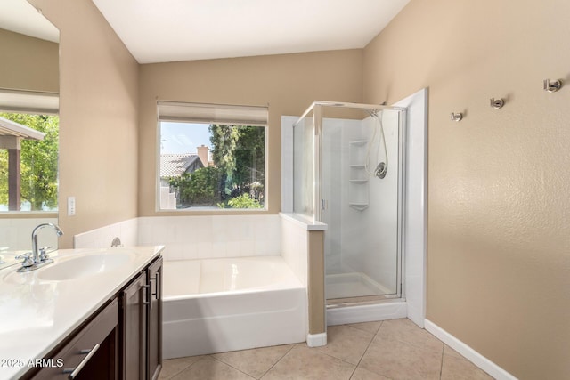 1379 E Butler Cir, Chandler, AZ 85225 - bathroom with a shower stall, tile patterned flooring, a bath, and vanity