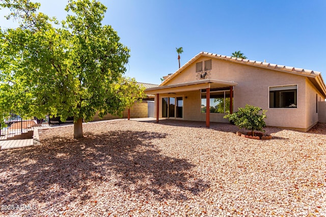 1379 E Butler Cir, Chandler, AZ 85225 - back of property featuring stucco siding and a patio area