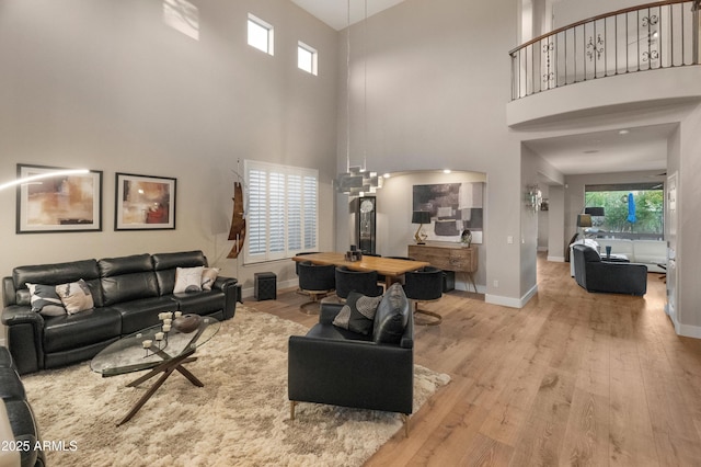 8447 W Tether Trl, Peoria, AZ 85383 - living room with a towering ceiling and wood finished floors