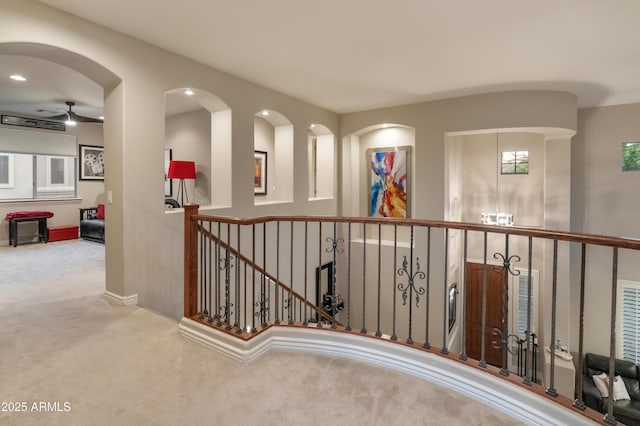 8447 W Tether Trl, Peoria, AZ 85383 - corridor featuring carpet and an upstairs landing