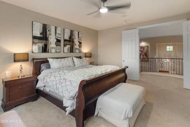 8447 W Tether Trl, Peoria, AZ 85383 - bedroom with light carpet and ceiling fan