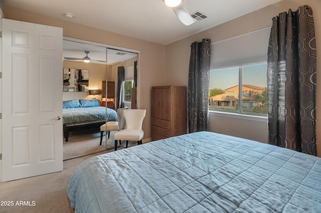 8447 W Tether Trl, Peoria, AZ 85383 - carpeted bedroom featuring multiple windows and a closet
