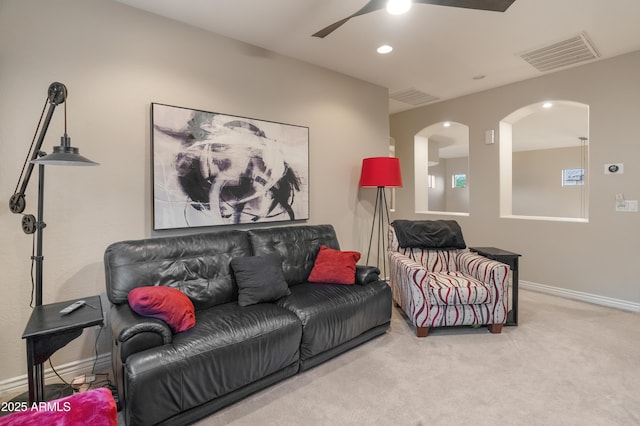 8447 W Tether Trl, Peoria, AZ 85383 - living area featuring a ceiling fan, arched walkways, carpet flooring, and recessed lighting