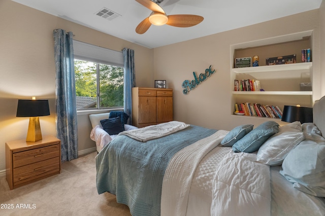 8447 W Tether Trl, Peoria, AZ 85383 - bedroom featuring light carpet and a ceiling fan