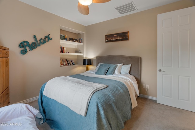 8447 W Tether Trl, Peoria, AZ 85383 - carpeted bedroom with ceiling fan and baseboards