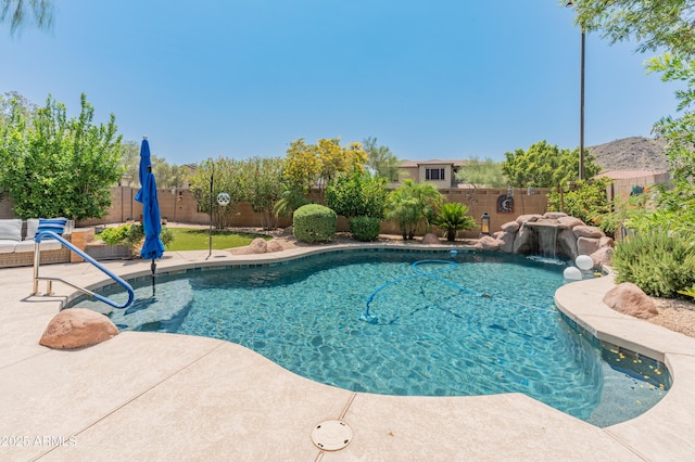 8447 W Tether Trl, Peoria, AZ 85383 - view of swimming pool with a fenced backyard and a patio area