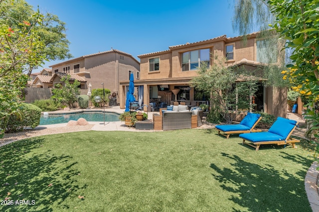 8447 W Tether Trl, Peoria, AZ 85383 - rear view of house with outdoor lounge area, a patio area, and stucco siding