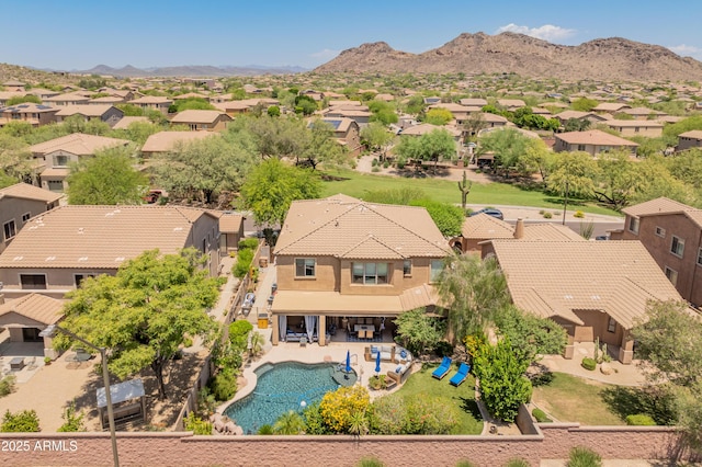 8447 W Tether Trl, Peoria, AZ 85383 - aerial perspective of suburban area with a mountain backdrop
