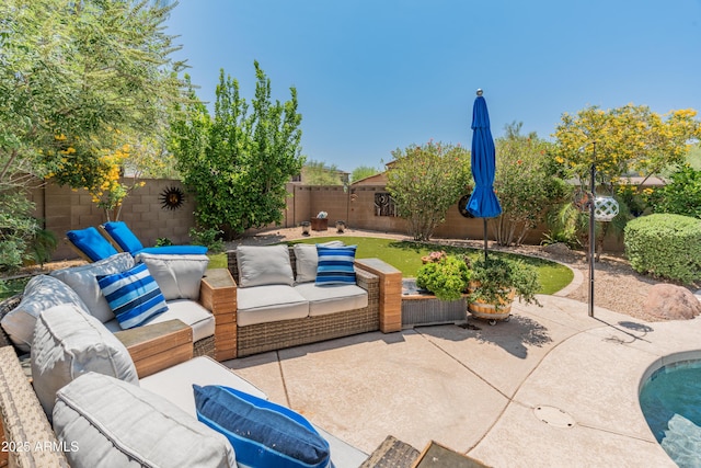 8447 W Tether Trl, Peoria, AZ 85383 - fenced backyard featuring an outdoor hangout area and a patio area
