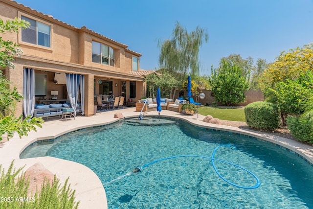 8447 W Tether Trl, Peoria, AZ 85383 - view of pool with an outdoor living space, a patio area, and a fenced backyard