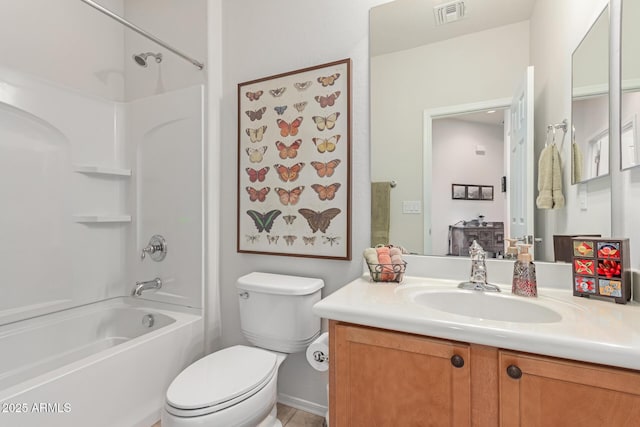 full bathroom featuring vanity, toilet, and washtub / shower combination