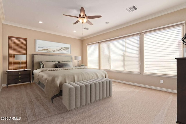 carpeted bedroom with ceiling fan and crown molding