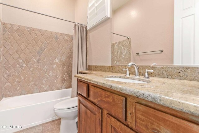 full bathroom with toilet, shower / bathtub combination with curtain, and vanity