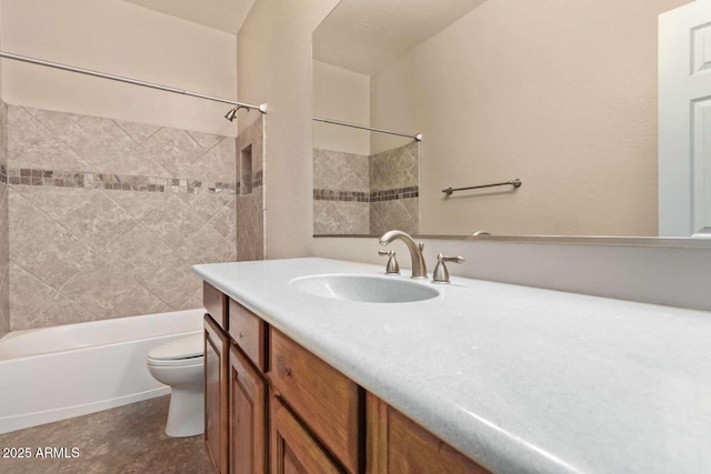 full bathroom with toilet, tiled shower / bath combo, and vanity