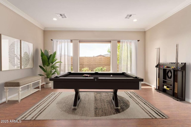 recreation room featuring billiards, crown molding, and hardwood / wood-style floors