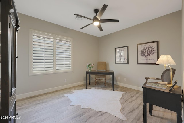 office area featuring light hardwood / wood-style flooring and ceiling fan