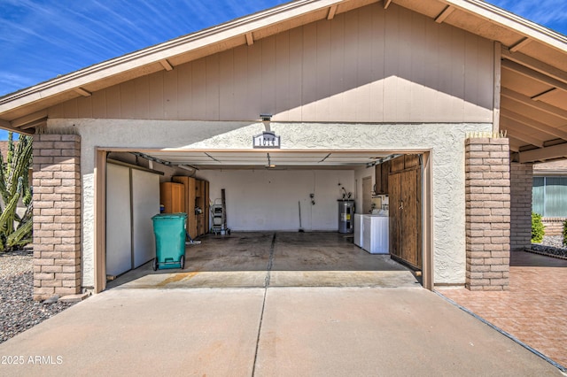 garage featuring water heater