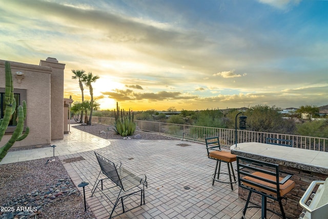 view of patio / terrace featuring outdoor dining area and fence